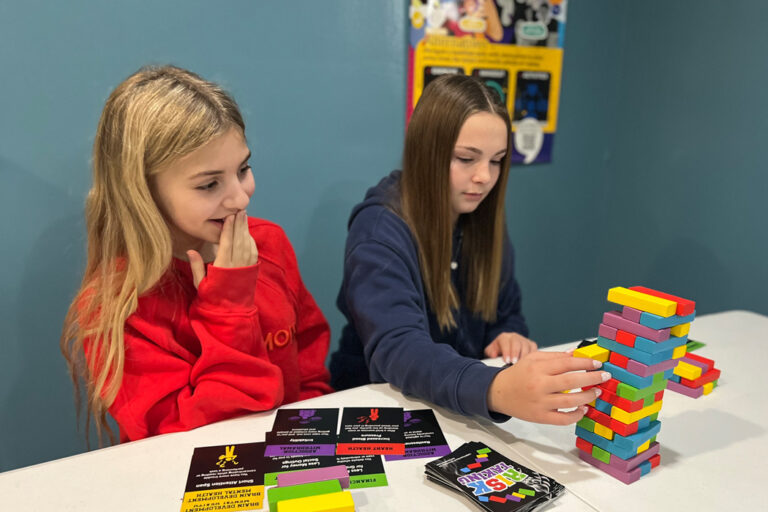 Students using the Vaping Dangers Kit to learn about the health risks of vaping through interactive activities.