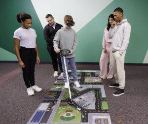 College students participating in an alcohol education activity using Fatal Vision impairment goggles