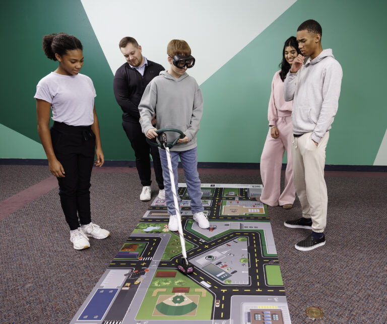 College students participating in an alcohol education activity using Fatal Vision impairment goggles